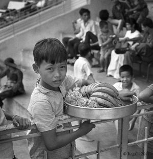 Saigon racetrack - boy vendor.jpg